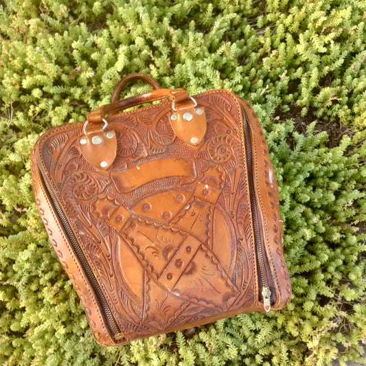 Gorgeous vintage tooled leather bowling bag turned Jewelry Carry on